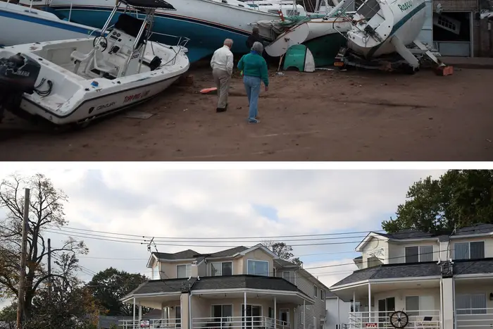 [Top] Boats pushed up by Hurricane Sandy lie against residences near a marina on November 2, 2012 in the Staten Island borough of New York City. [Bottom] A woman walks her dog near a marina on October 17, 2013 in the Staten Island borough of New York City.